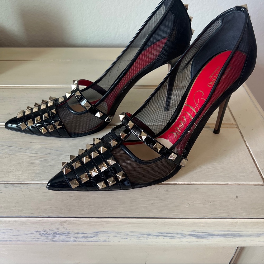 Valentino Rockstud Alcove pumps.making them perfect for any special occasion